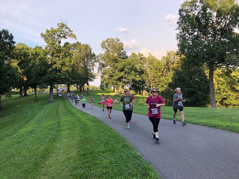 Runners at a 2019 5K through Mahr Park Arboretum