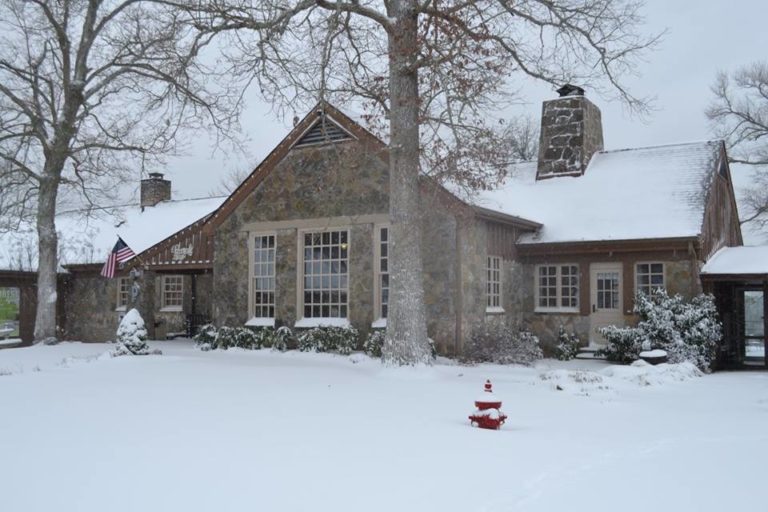 Snowy scene of the lodge at Pennyrile Forest State Resort Park in Hopkins County