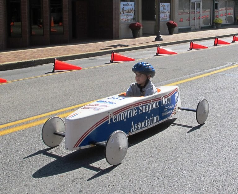 Boy competing in soapbox derby
